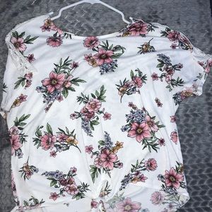 White t-shirt with flowers.